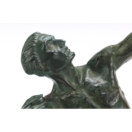 597 - Art Deco patinated spelter sculpture of an archer raised on a rectangular marble base, 52.5cm high