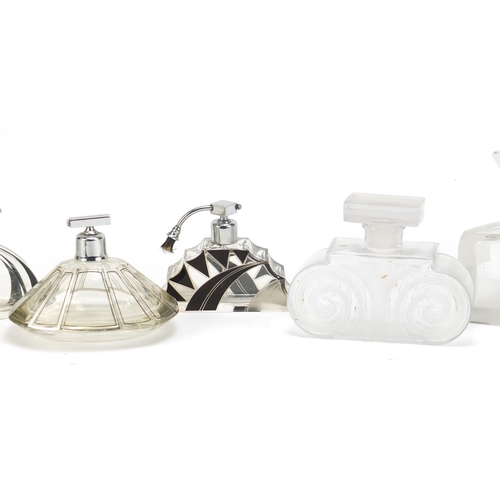 565 - Seven Art Deco glass atomisers/scent bottles, some flashed and some etched, the largest 14cm high