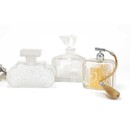 565 - Seven Art Deco glass atomisers/scent bottles, some flashed and some etched, the largest 14cm high