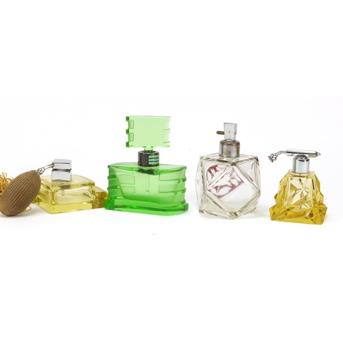 566 - Six Art Deco cut glass atomisers/scent bottles, the largest 11.5cm high