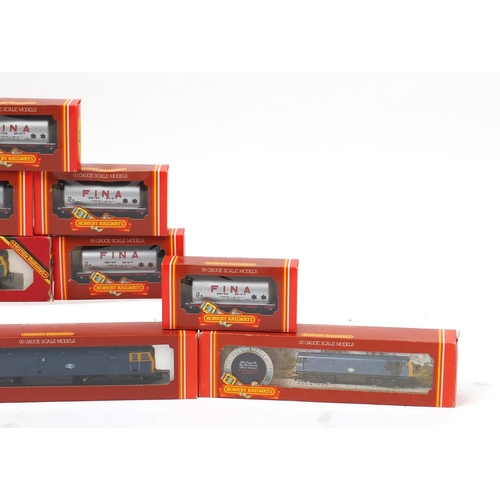 151 - Hornby 00 guage model railway with boxes, comprising four diesel locomotives and ten advertising wag... 