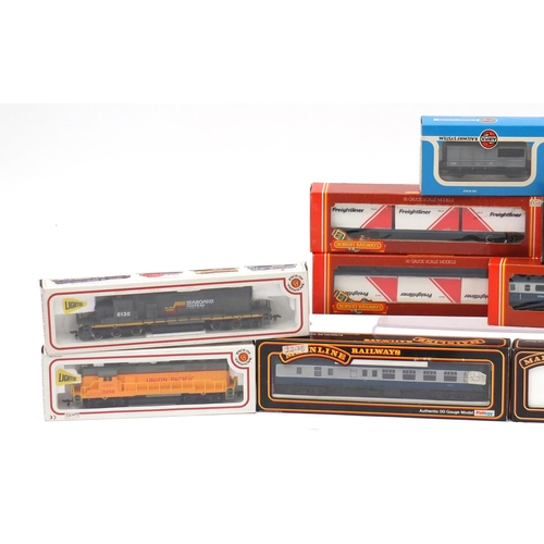 153 - 00/HO guage model railway with boxes including Wrenn, mainline railways and two Bachmann electric di... 