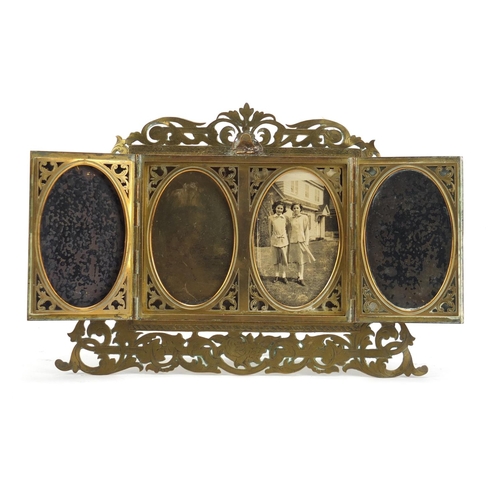 104 - Victorian brass four section frame by Hopkins, finely engraved with flowers, 22.5cm wide