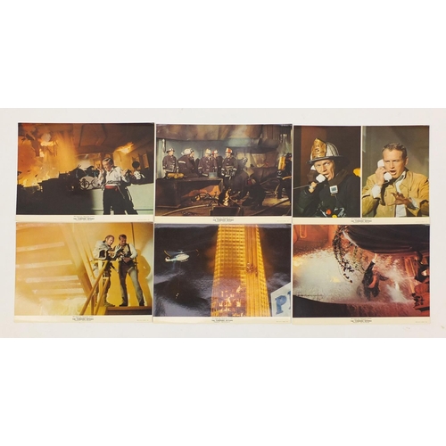 185 - Two vintage The Towering Inferno UK quad film posters and six Warner Bros stills, the posters printe... 