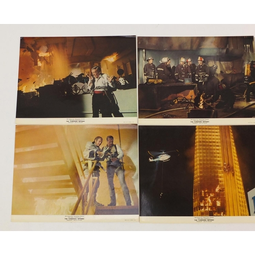 185 - Two vintage The Towering Inferno UK quad film posters and six Warner Bros stills, the posters printe... 