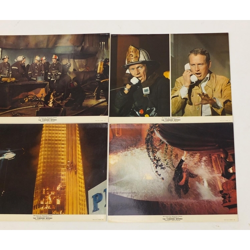 185 - Two vintage The Towering Inferno UK quad film posters and six Warner Bros stills, the posters printe... 