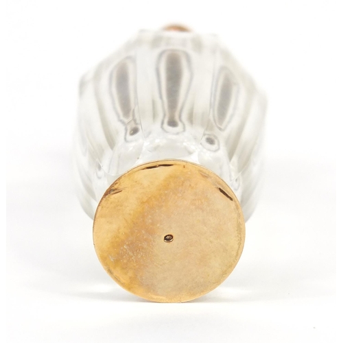 22 - Dutch cut glass scent bottle with 14K gold mounts, impressed oak leaf to the mounts, 10.5cm high