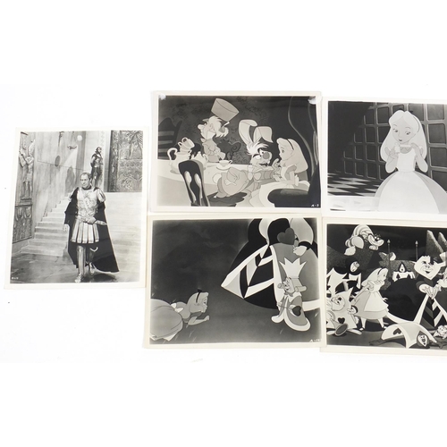 200 - Vintage black and white movie stills, including Walt Disney and Alice in Wonderland, each approximat... 