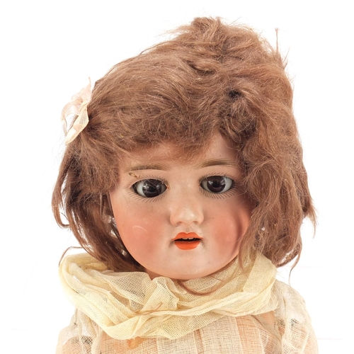 144 - German bisque headed doll with jointed limbs by Simon and Halbig, numbered 1909
