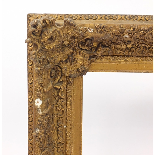 987 - 19th century ornate Gesso picture frame, aperture size 75cm x 62cm, overall size 102cm x 91cm