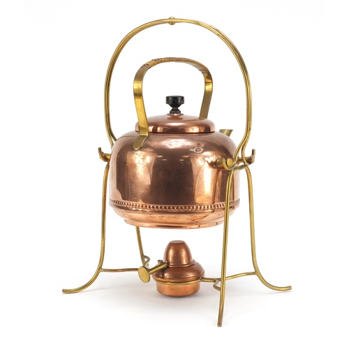 592 - German secessionist copper and brass teapot on stand with burner, impressed marks to the underside o... 