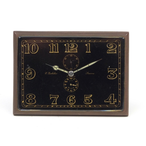 96 - E Gublin eight day travel alarm clock with luminous hands, numbered 20848, 8cm high x 11cm wide