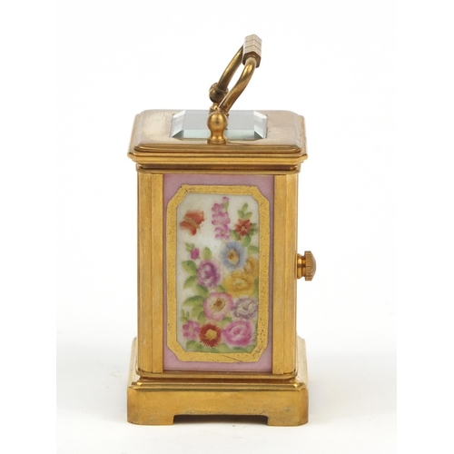 54 - Gilt brass miniature carriage clock with Sevres style porcelain panels decorated with flowers, numbe... 