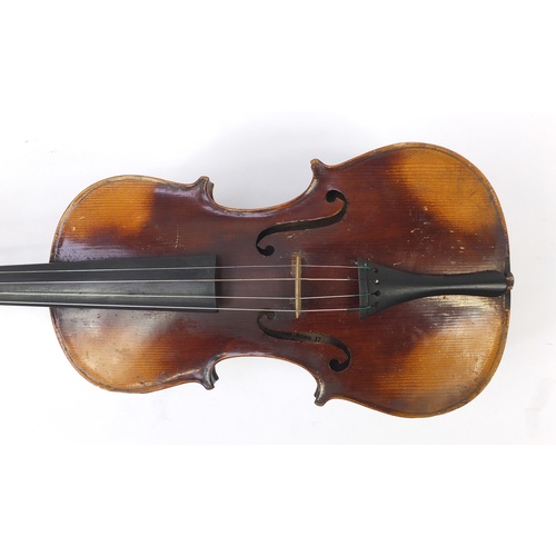 88 - Old wooden violin with bow and case, the violin bearing a Stradivarius paper label, the violin back ... 