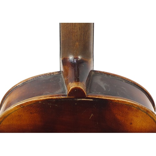 88 - Old wooden violin with bow and case, the violin bearing a Stradivarius paper label, the violin back ... 