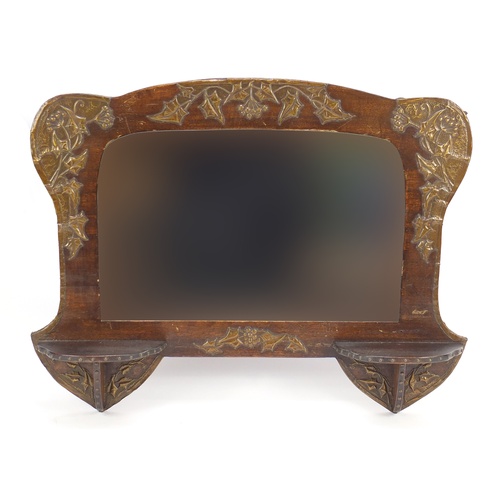 596 - Arts and Crafts oak wall mirror with applied embossed metal mounts, 44.5cm high x 57cm wide