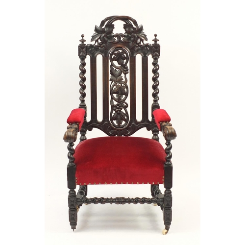 2046 - Oak barley twist throne chair carved with berries on vines, 132cm high