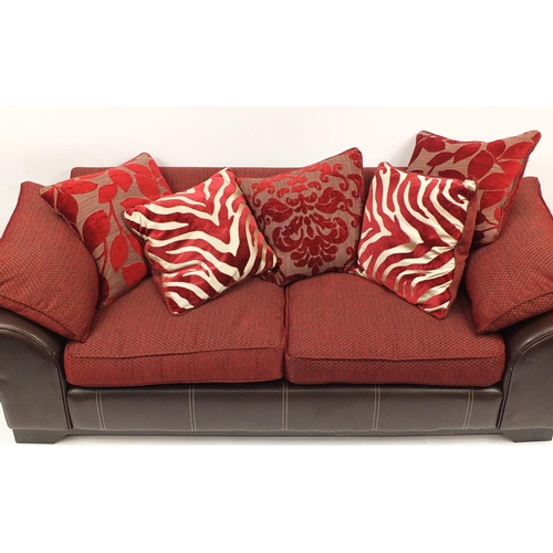 2020 - Contemporary brown leather and red fabric upholstered three seater settee, with two storage foot sto... 