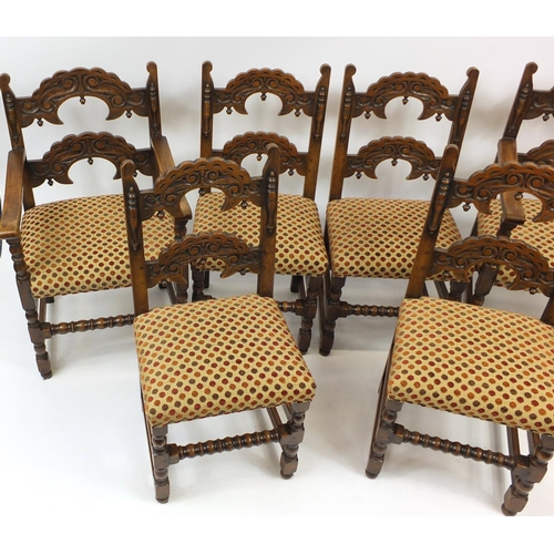 2009 - Set of six carved oak dining chairs including two carvers, with polka dot upholstered stuff over sea... 