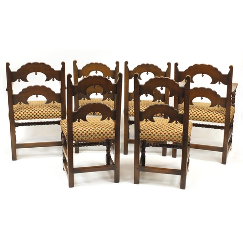 2009 - Set of six carved oak dining chairs including two carvers, with polka dot upholstered stuff over sea... 