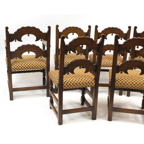 2009 - Set of six carved oak dining chairs including two carvers, with polka dot upholstered stuff over sea... 