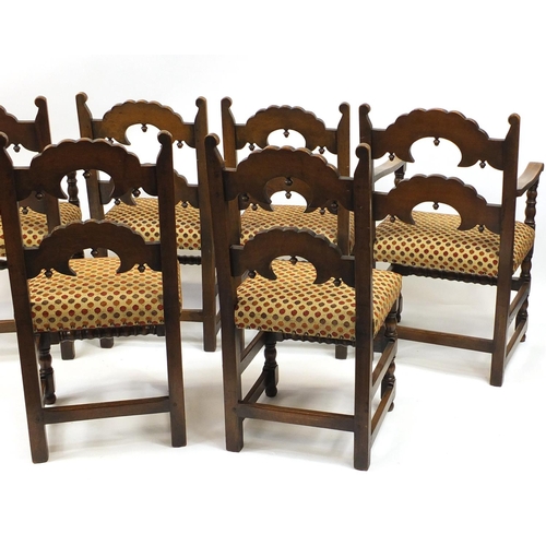 2009 - Set of six carved oak dining chairs including two carvers, with polka dot upholstered stuff over sea... 