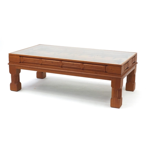 2060 - Middle Eastern teak coffee table housing an Omani window with iron mounts, 44cm H x 129cm W x 67cm D