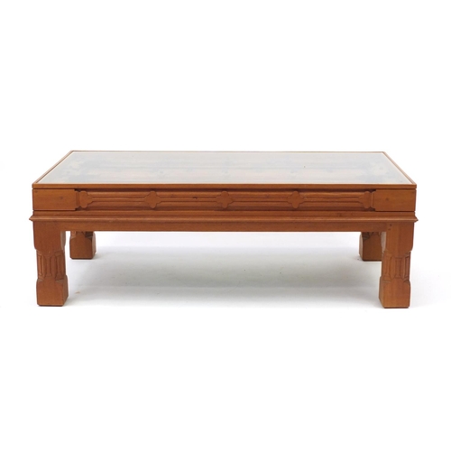 2060 - Middle Eastern teak coffee table housing an Omani window with iron mounts, 44cm H x 129cm W x 67cm D