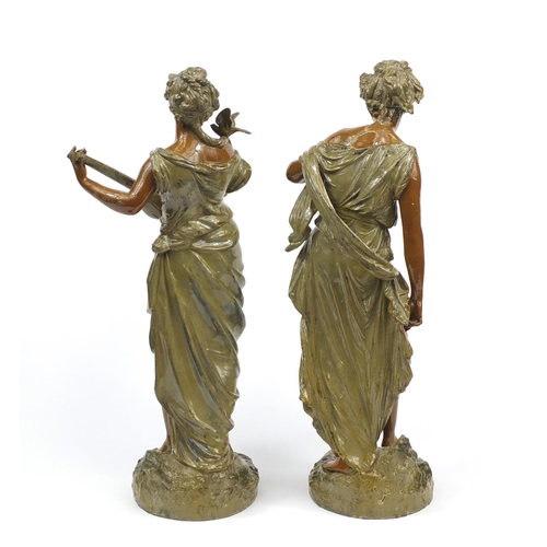 2100 - Pair of Art Nouveau cold painted spelter figures of maidens, the largest 49cm high