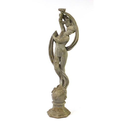 2021 - Reconstituted stoneware garden statue of a nude maiden standing on a ball, 170cm high