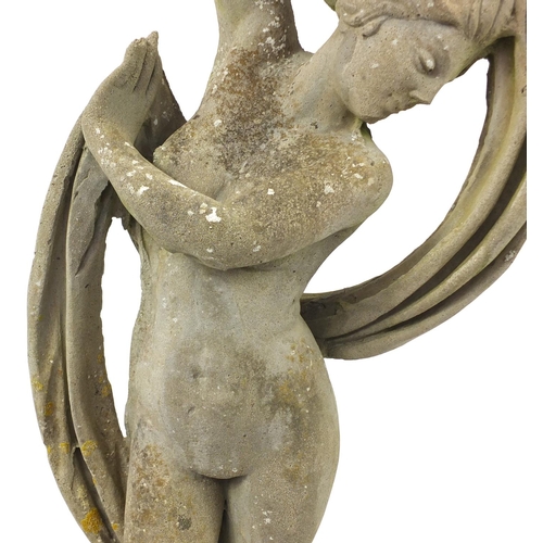 2021 - Reconstituted stoneware garden statue of a nude maiden standing on a ball, 170cm high
