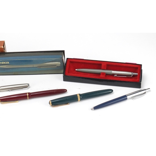 2482 - Vintage and later fountain pens, ballpoint pens and a silver pencil holder, including Conway Stewart... 