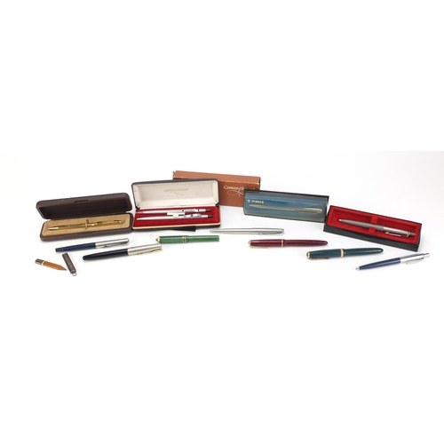 2482 - Vintage and later fountain pens, ballpoint pens and a silver pencil holder, including Conway Stewart... 