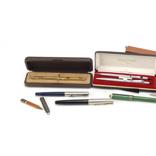 2482 - Vintage and later fountain pens, ballpoint pens and a silver pencil holder, including Conway Stewart... 