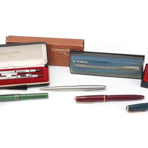 2482 - Vintage and later fountain pens, ballpoint pens and a silver pencil holder, including Conway Stewart... 