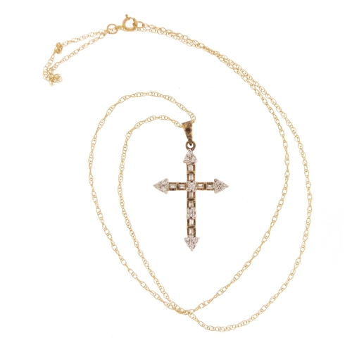 2535 - 9ct gold clear stone cross pendant on a 9ct gold necklace, the pendant 3.5cm in length, 2.2g