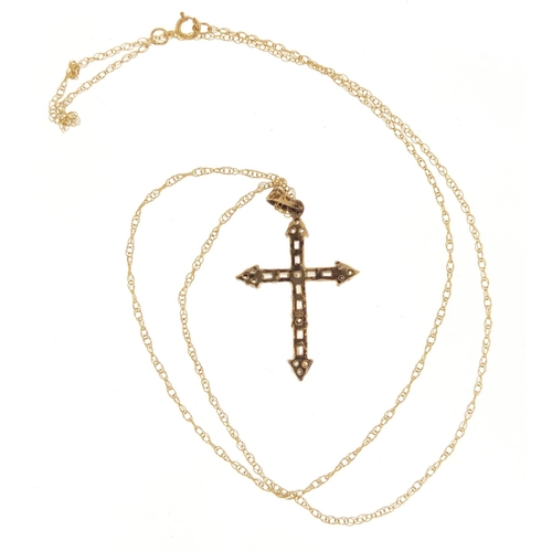 2535 - 9ct gold clear stone cross pendant on a 9ct gold necklace, the pendant 3.5cm in length, 2.2g