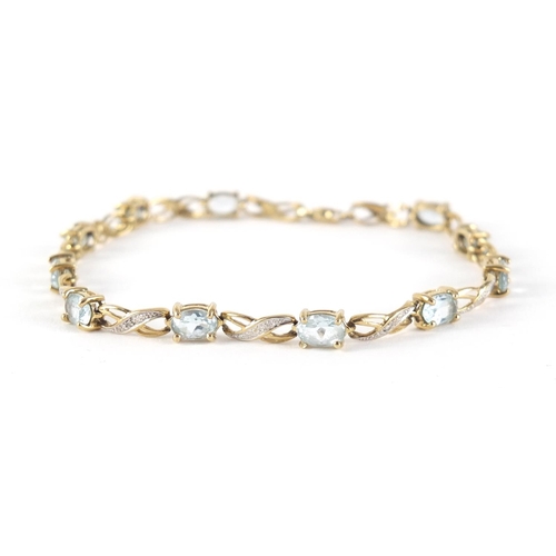 2533 - 9ct gold blue stone and diamond bracelet, 20cm in length, 6.2g