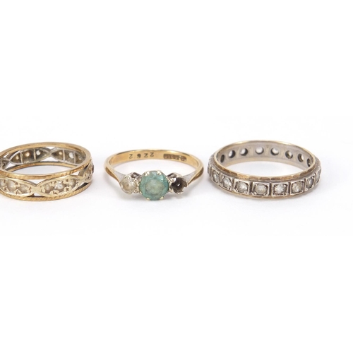 2527 - Four 9ct gold rings, including two eternity rings set with clear stones, various sizes, 8.5g