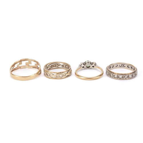 2527 - Four 9ct gold rings, including two eternity rings set with clear stones, various sizes, 8.5g