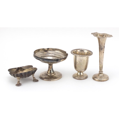 2500 - Silver items comprising two vases, a pedestal bonbon dish and a Victorian shell shaped open salt, va... 