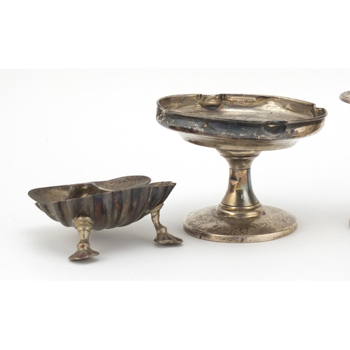 2500 - Silver items comprising two vases, a pedestal bonbon dish and a Victorian shell shaped open salt, va... 