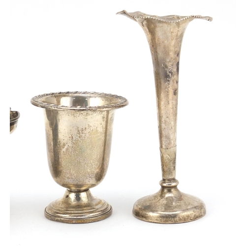 2500 - Silver items comprising two vases, a pedestal bonbon dish and a Victorian shell shaped open salt, va... 