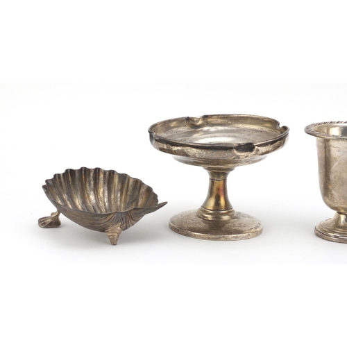 2500 - Silver items comprising two vases, a pedestal bonbon dish and a Victorian shell shaped open salt, va... 