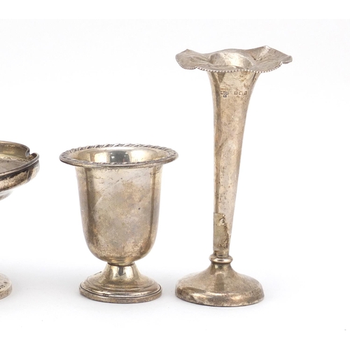 2500 - Silver items comprising two vases, a pedestal bonbon dish and a Victorian shell shaped open salt, va... 