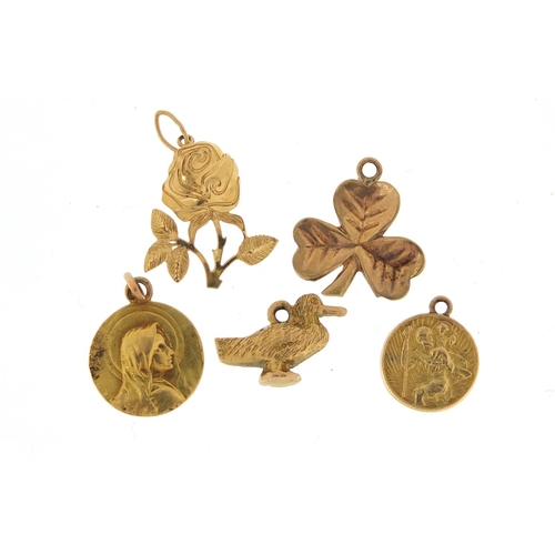 2558 - Five 9ct gold charms including St Christoper and a duck, 5.3g