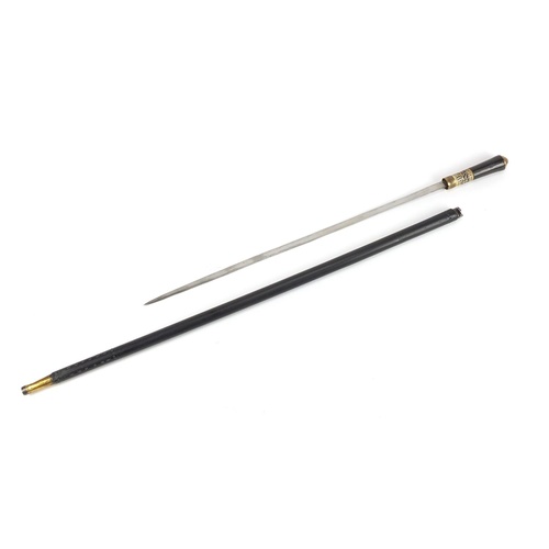 92 - Indian ebony sword stick with carved bone section and steel blade, 92cm in length