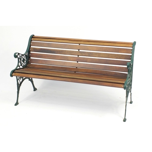 79 - Cast iron and teak garden bench, 71cm H x 127cm W x 58cm D