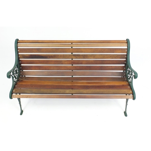 79 - Cast iron and teak garden bench, 71cm H x 127cm W x 58cm D