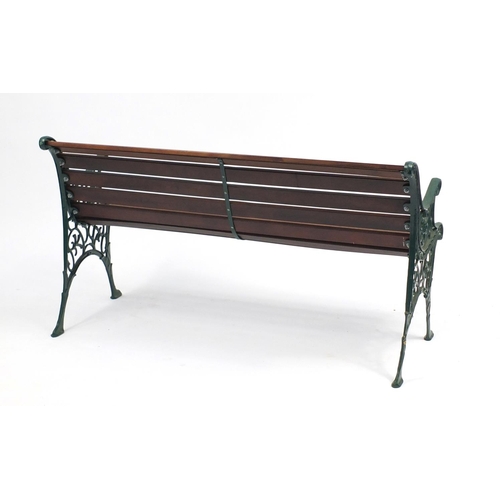 79 - Cast iron and teak garden bench, 71cm H x 127cm W x 58cm D